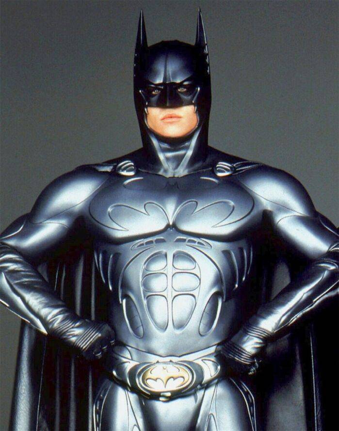 Christian Bale's Dark Knight batsuit in shadowy lighting