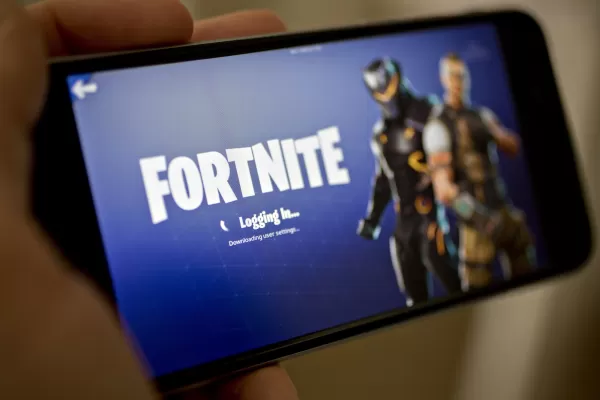 Fortnite è finalmente destinato a tornare agli iPhone negli Stati Uniti, quasi cinque anni dopo che la partita è stata tirata. Fotografo: Andrew Harrer/Bloomberg tramite Getty Images.